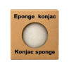 Konjac sponge in its kraft cardboard sleeve with round window